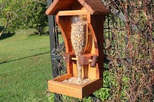 Recycled wine bottle diy bird feeder
