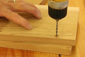 Pre drill screw holes when assembling bird house.