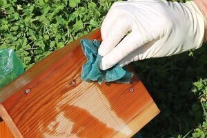 Apply linseed oil to protect bird house.