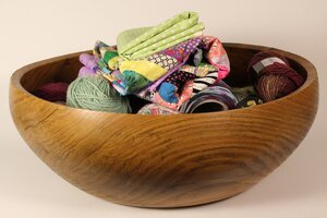Large wooden oak bowl with yarn