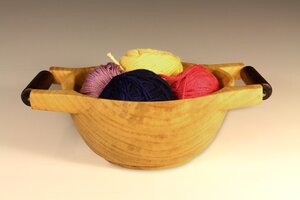 Wooden bowl with handles
