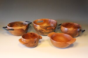 Wooden bowls with handles