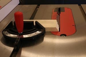 Table saw 30-degree blade tilt for honeycomb display shelves.