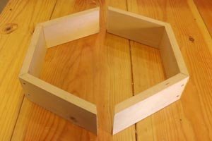 Two halves hexagon wall shelf.