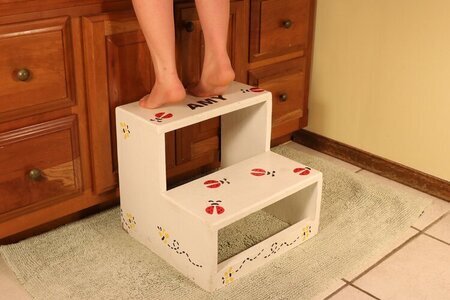 Small wooden step stool for kids or adults.