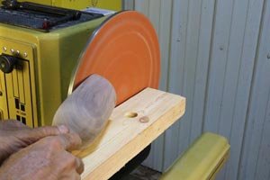Round corners of scoop, remove excess tenon on bottom, and finish.